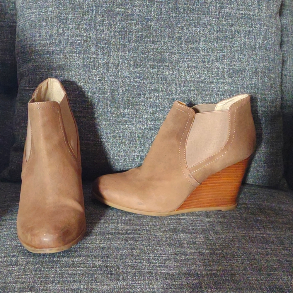 Audrey Brooke leather wedge booties.